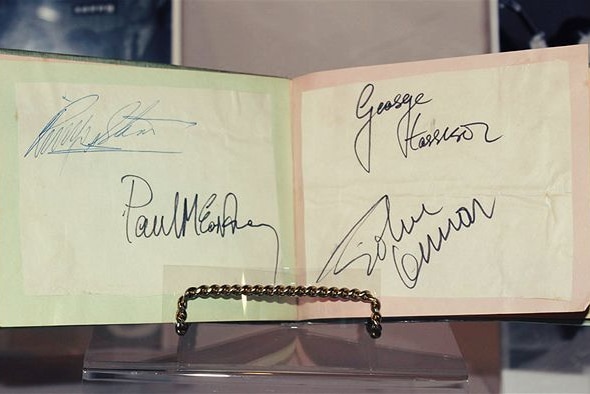 Beatles autographs in book