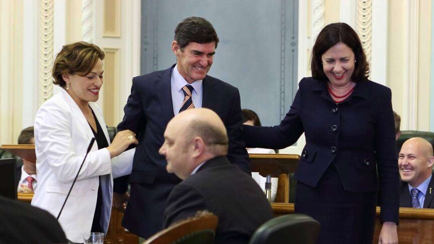 Nicklin MP Peter Wellington being taken to the Speaker's chair in Queensland Parliament