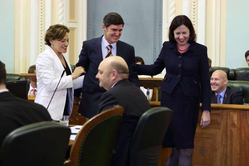 Nicklin MP Peter Wellington being taken to the Speaker's chair in Queensland Parliament