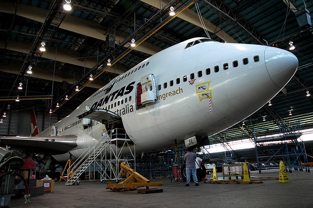 A Qantas jumbo jet in the maintenance hangar at Avalon Airport.