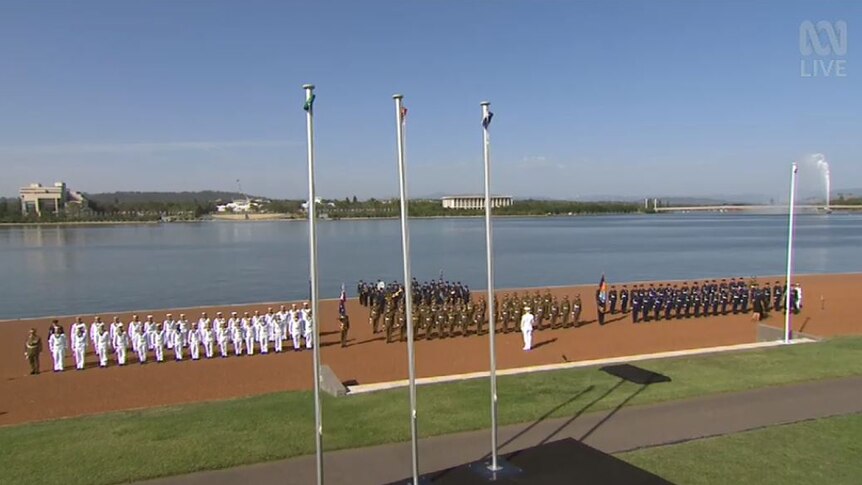 Military personnel form on the banks of Lake Burley Griffin in Canberra on Australia Day 2019.