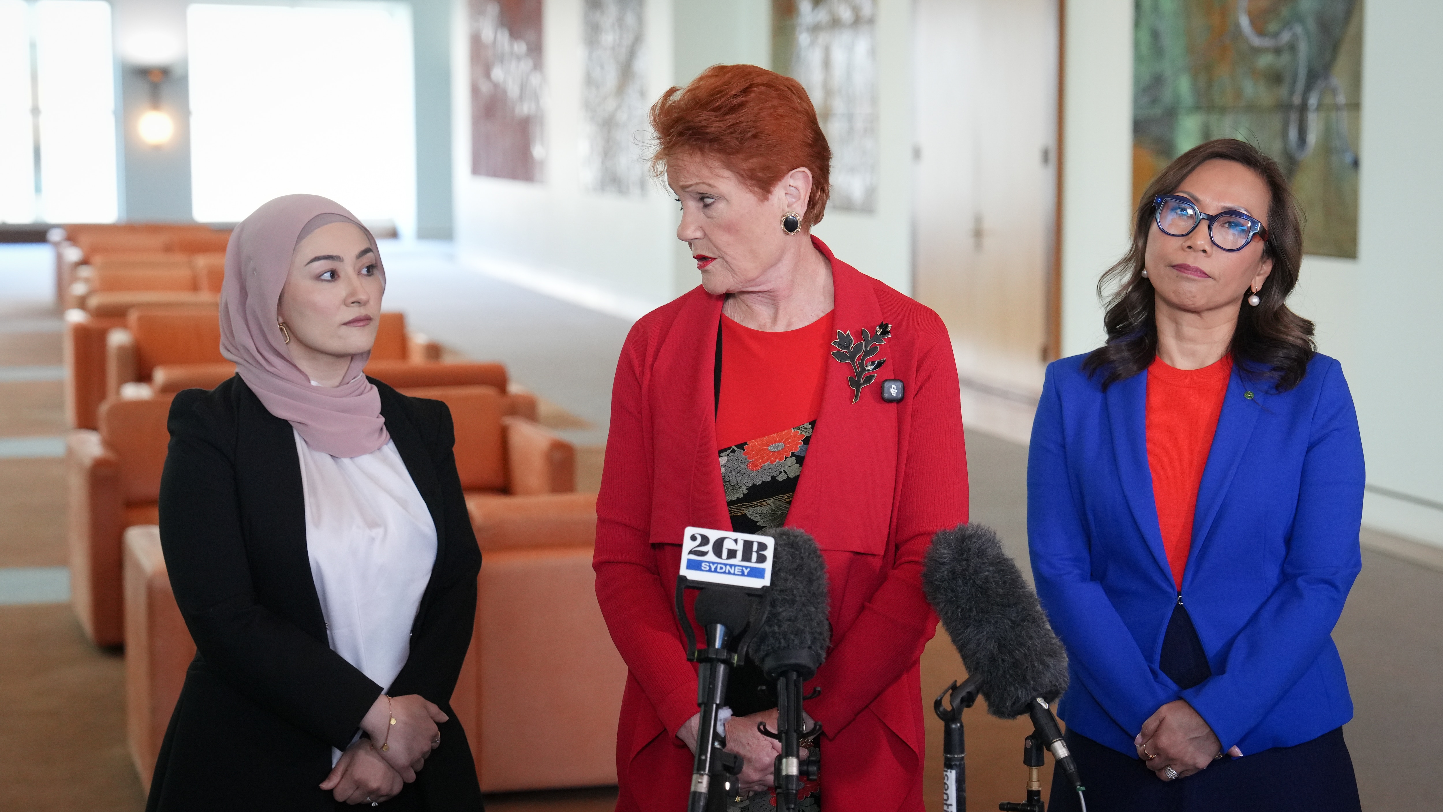 Pauline Hanson, Fatima Payman and Dai Le speak at a press conference.