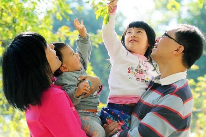Xiaoning Mo and her family was enjoying their time in the garden.