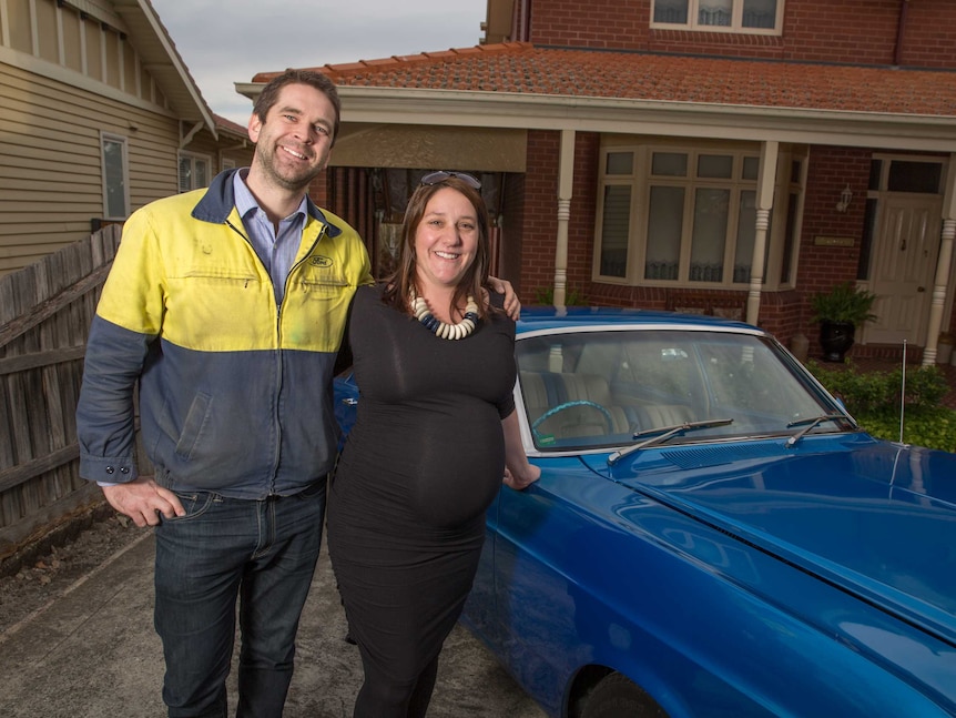 Suzanne McConchie with her family and their Ford cars