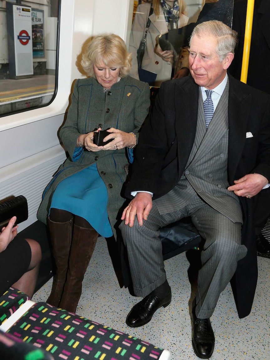 Prince Charles and Camilla on the tube.