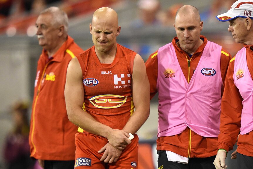 Gary Ablett leaves a game against Brisbane early