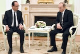 Francois Hollande speaks with Vladimir Putin in Moscow