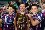 Billy Slater, Cameron Smith and Cooper Cronk with the premiership trophy.