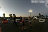 A police image of young people boxing in the twilight, faces have been blurred. 