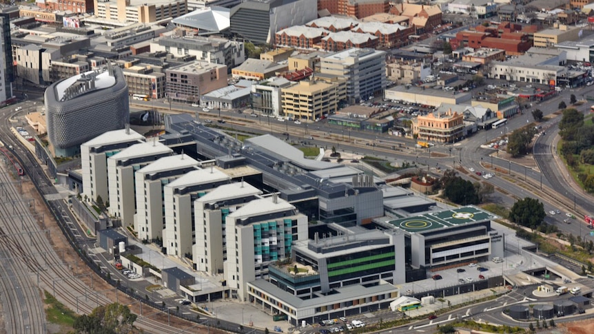 Aerial view of the new Royal Adelaide Hospital on North Terrace and the city rail lines.