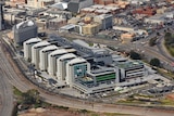 Aerial view of the new Royal Adelaide Hospital on North Terrace and the city rail lines.