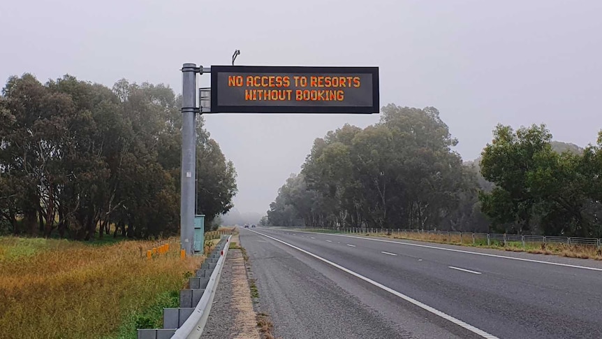 sign that says 'no access to resorts without booking' on hume highway