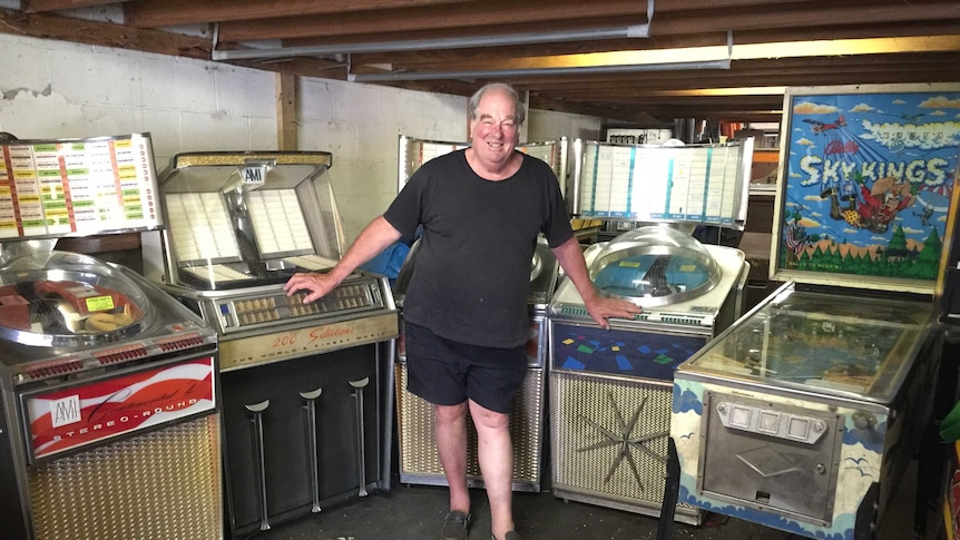 Edwin Boot with some of his pinball machines and juke boxes.
