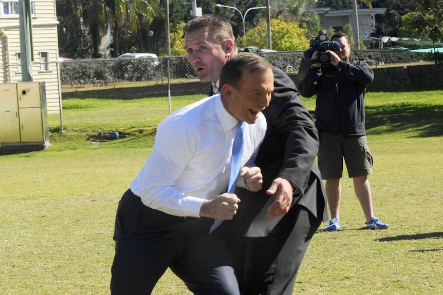 Tony Abbott has some fun with former Brisbane Broncos player Shane Webcke