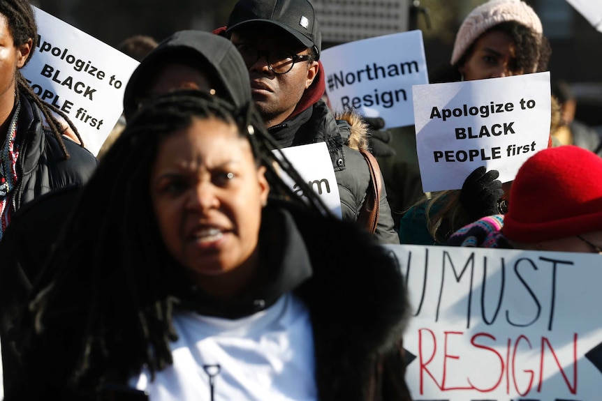 demonstrators protesting outside the Governors Mansion in Virginia