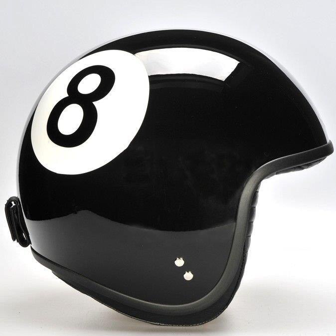 A black motorbike helmet with the number eight emblazoned on the side.