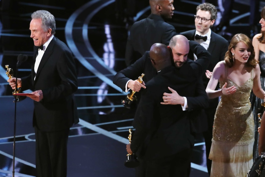 The scene as La La Land hands over best picture Oscar to Moonlight