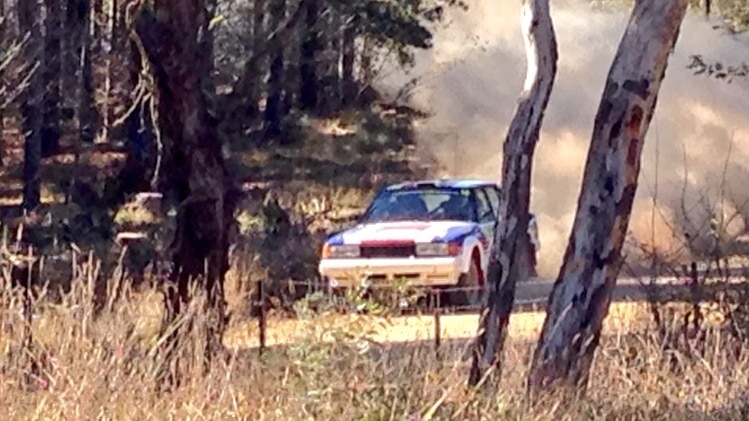 Dust conditions as competitors race in the National Capital Rally event on Canberra's outskirts.