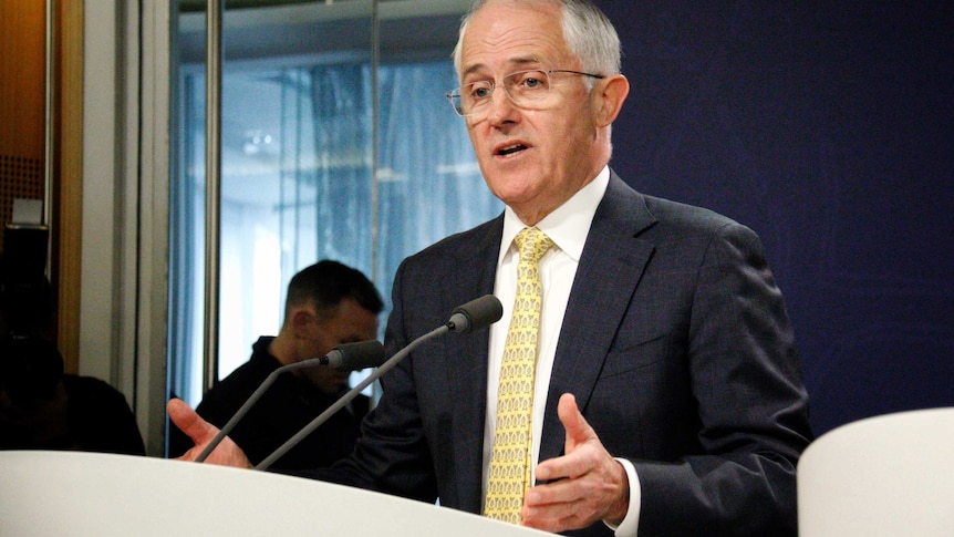 Malcolm Turnbull gestures as he speaks to the media.