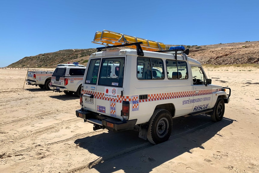 Three state emergency rescue vehicles parked on Maslin beach