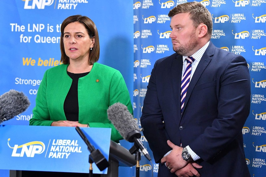 The LNP leader and president addressing reporters on a podium