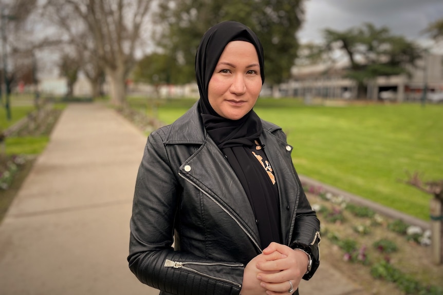 Woman stand in a park