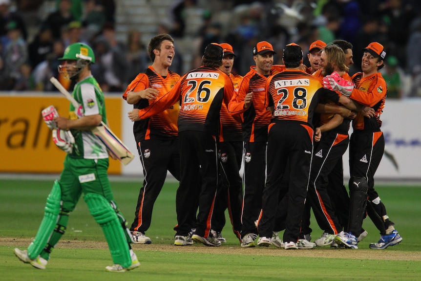 Perth Scorchers celebrate after winning the T20 Big Bash League match against Melbourne Stars. (Scott Barbour/Getty Images)