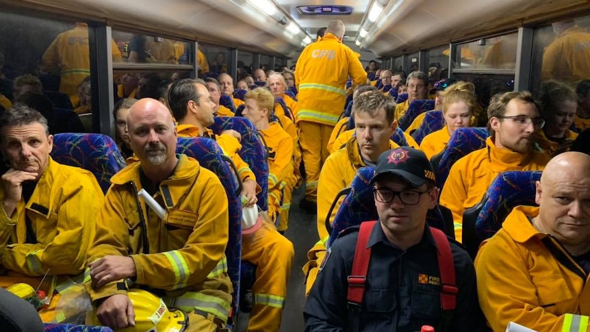 Firefighters pack a bus on Kangaroo Island.