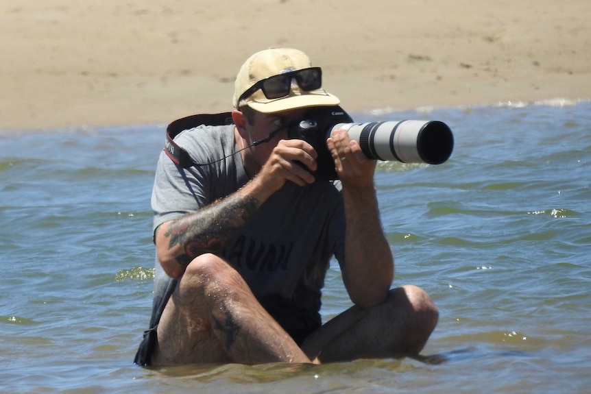 Liam Murphy photographing Aleutian Terns at Old Bar.