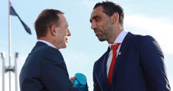 Adam Goodes shakes Tony Abbott's hand