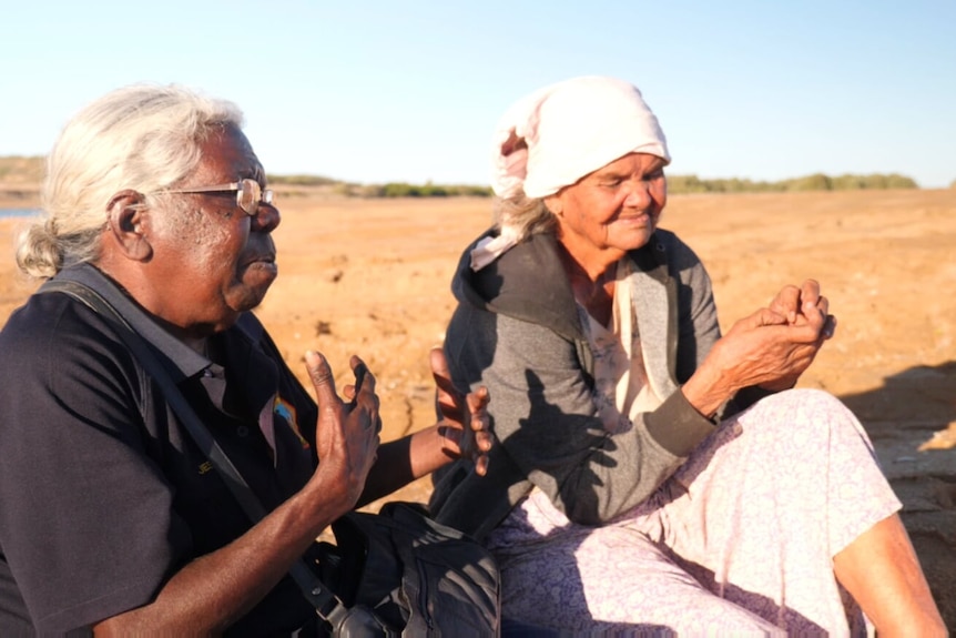 Two women looking concerned about another earthquake