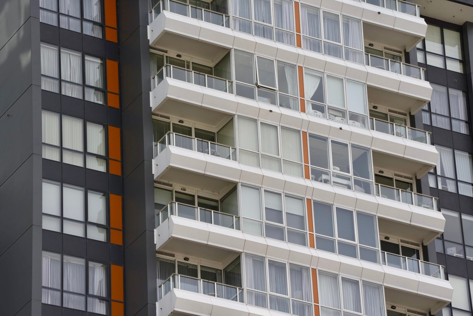 A high-rise apartment complex with balconies