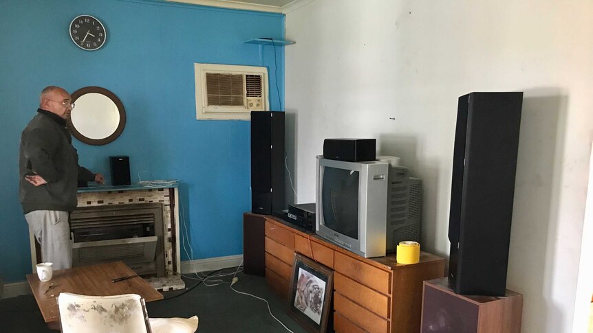 Arthur Johnson looks at an old fashioned solid television and stereos.