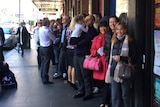 AFL members line up for the chance to a ticket to the 2014 grand final.