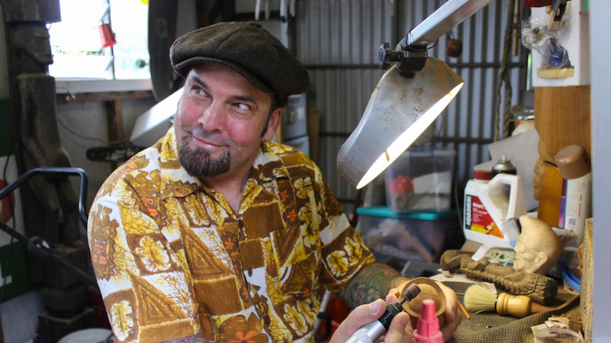 Marcus Thorn makes many tikis from hand and teaches others about the art form through workshops.