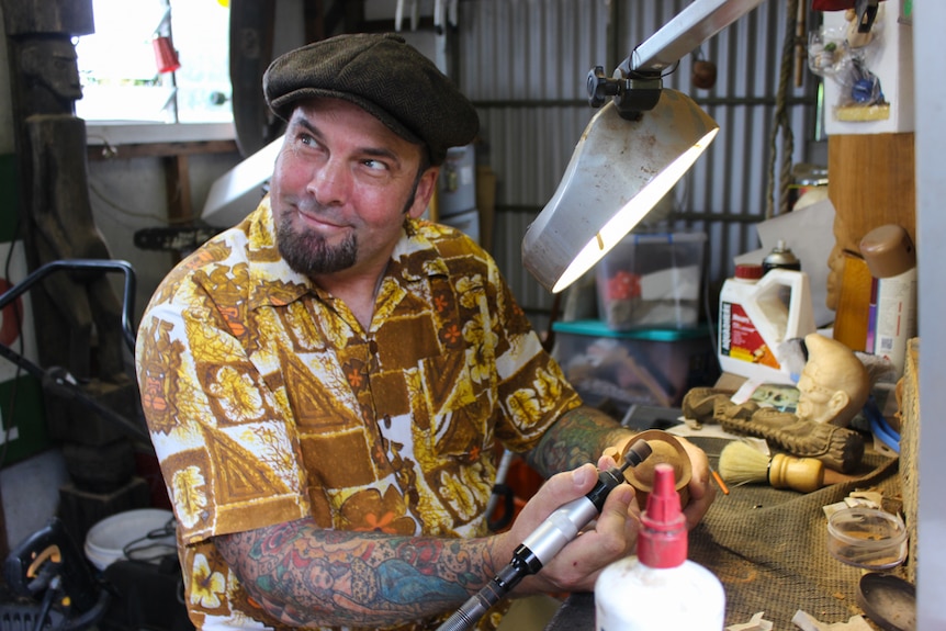 Marcus Thorn makes many tikis from hand and teaches others about the art form through workshops.
