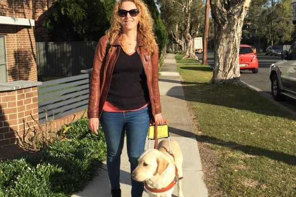 A woman and her guide dog