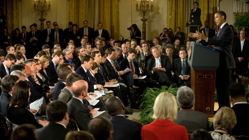 Obama faces the press