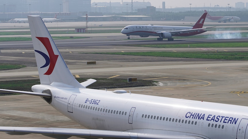 A China Eastern Airlines aircraft and a Shanghai Airlines aircraft are seen in Hongqiao International Airport in Shanghai.