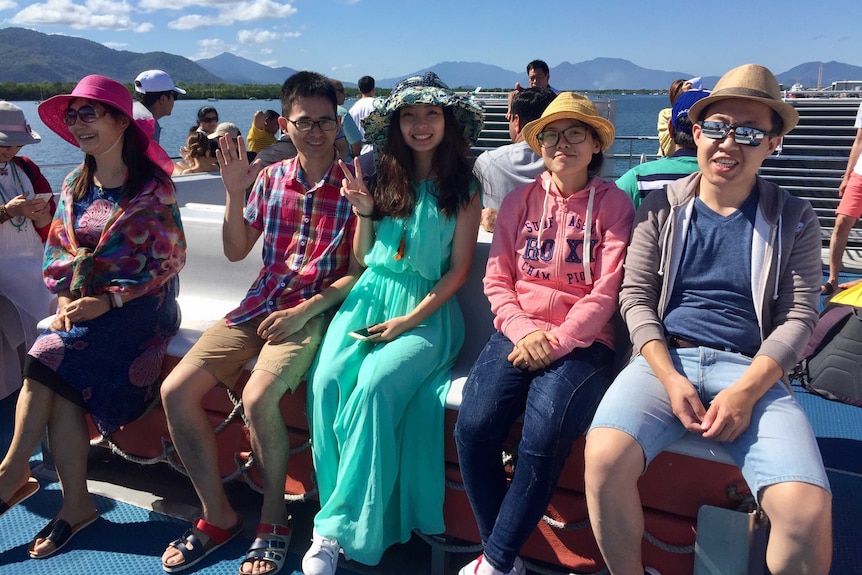Chinese tourists on a Cairns reef cruise.