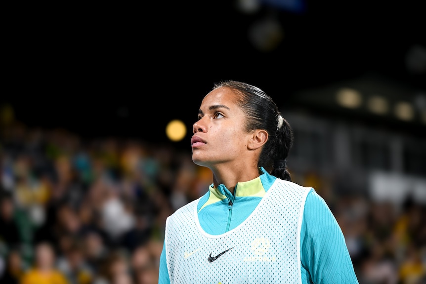 Matildas forward Mary Fowler takes a moment to scan the crowd before a sell out game against Chinese Taipei at Perth Stadium. 