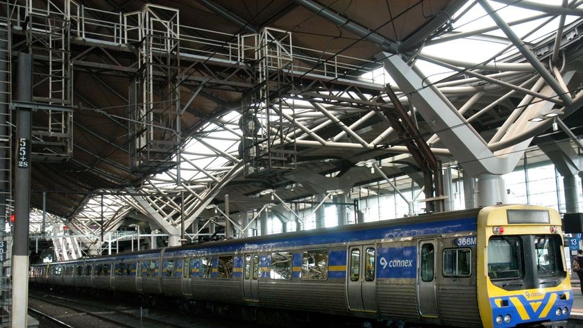 A Connex commuter train sits at Melbourne's Southern Cross Station