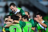 Divine intervention: North Queensland celebrates a ninth A-League goal for captain Robbie Fowler.