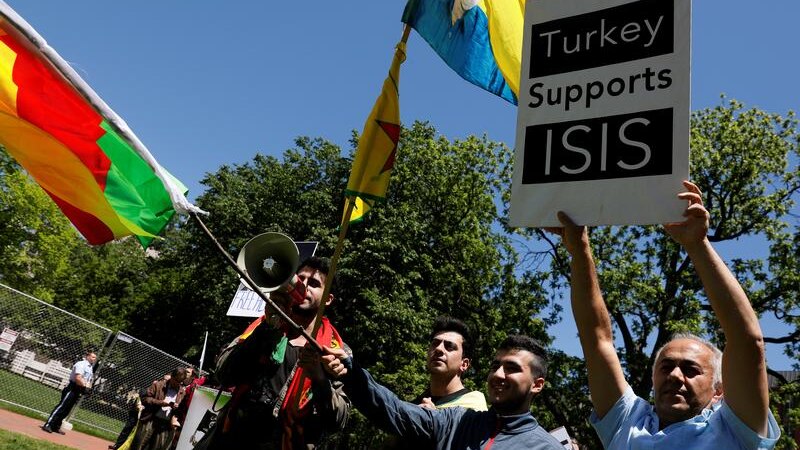 A group of anti-Erdogan Kurds shout slogans