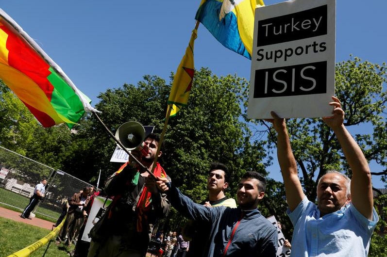 A group of anti-Erdogan Kurds shout slogans