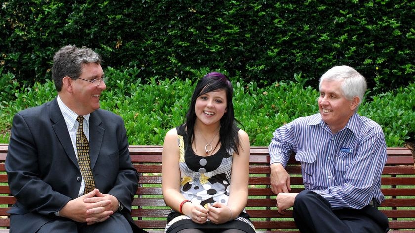 Liver transplant recipient Demi-Lee Brennan (c) with (l-r) Dr Stephen Alexander and Dr Stuart Dorney at Westmead Hospital in Sydney.