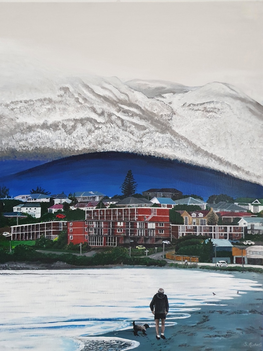 A painting of a man and his dog walking on the beach with a snowy mountain in the background