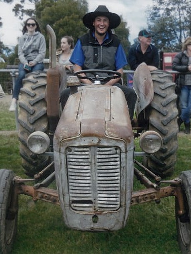 Braidon Lewis Fletcher on a tractor.