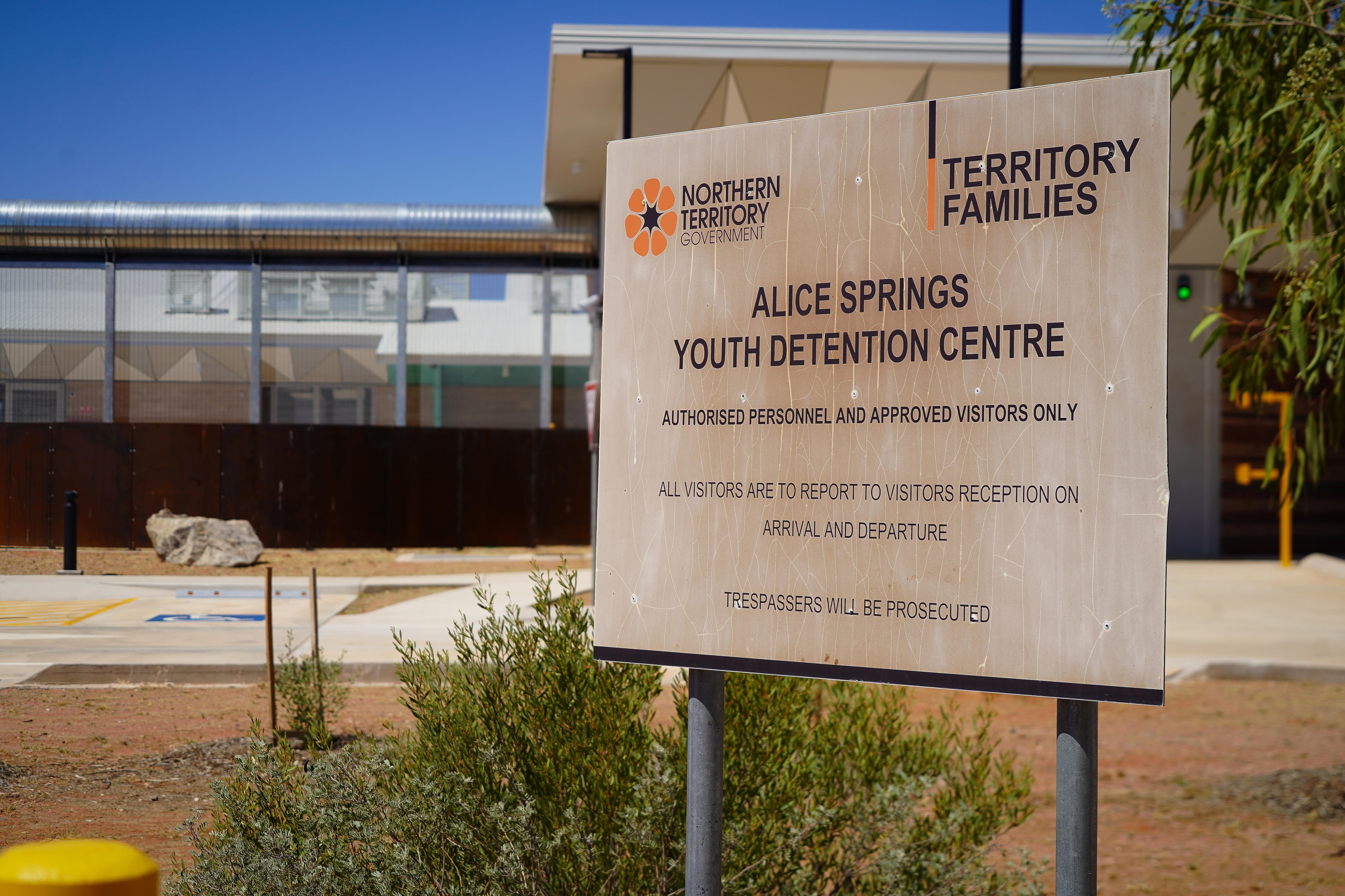 A sign showing Alice Springs Youth Detention Centre, in front of the entrance to the prison.