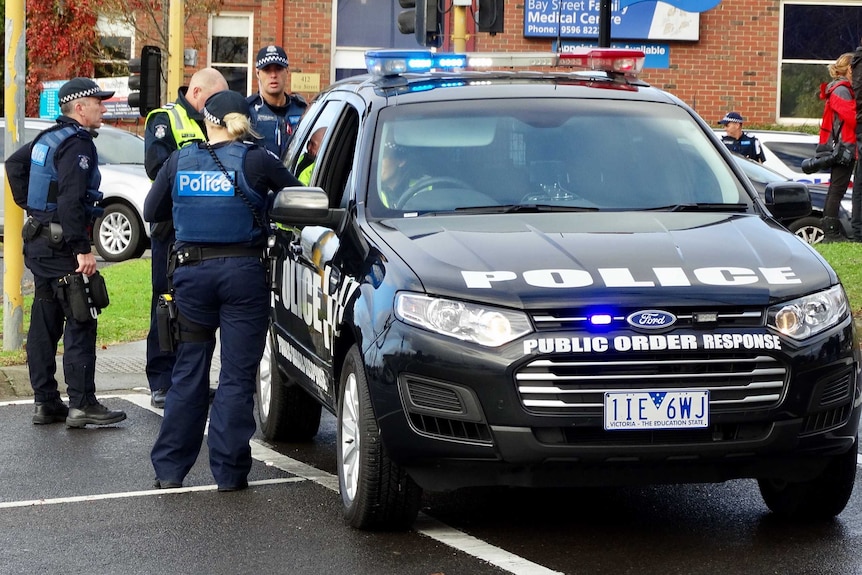 A police car blocks a road near the scene of the fatal Brighton terrorist incident.